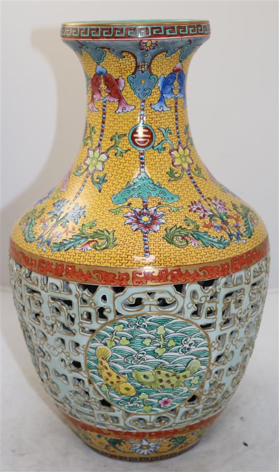 A Chinese yellow ground double-walled reticulated vase, modern, 42cm